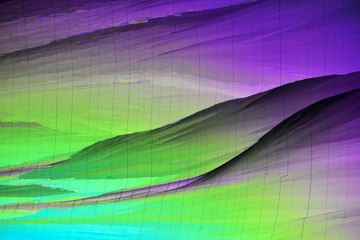 Colorful micro crystals in polarized light. Photo through a microscope.