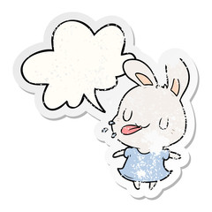 cute cartoon rabbit blowing raspberry and speech bubble distressed sticker
