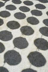 Abstract view of shadow from lanterns on the ground.