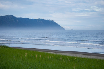 misty oregon coast line with ocean