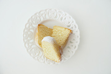 Homemade Cake Slices in a Plate isolated on a White Background