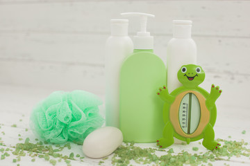 Bathing accessories. Bottles and tubes with shampoo, gel, lotion. Body care stuff. Shower toiletries.