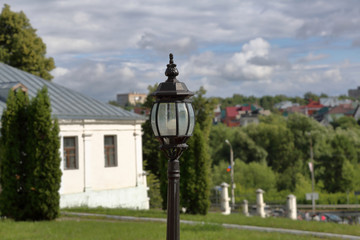 Vintage black iron lantern on a city street