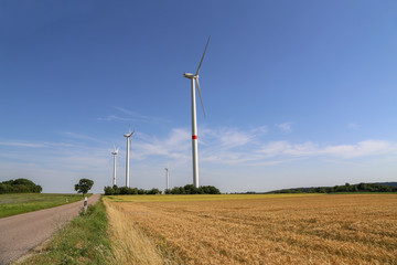 Fototapeta premium Wind engines in the fields in Germany
