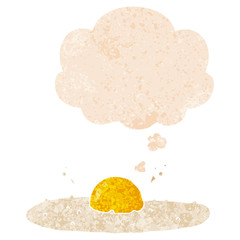 cartoon fried egg and thought bubble in retro textured style