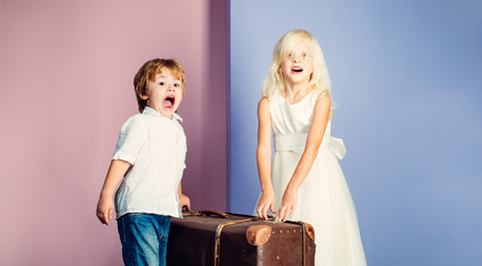 Happy childhood. Boy and girl cute friends. Friendship and love. Lovely tender children. Small kids friendship. Sincere friendship. We are moving on. Relocation concept. Couple kids with suitcase
