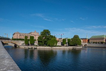 Obraz premium Whinchat on a pole in the bird protection area Hjälstaviken close to Stockholm