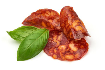 Spanish pork chorizo sausage slices, close-up, isolated on white background