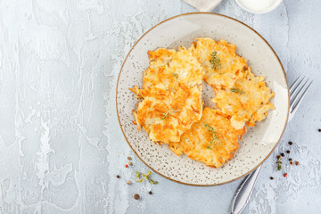 Pan-fried potato pancakes - rosti, kartoffelpuffer, latkes, draniki, hash browns