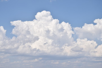Clouds Cirrocumlus during the day. Clouds in the blue sky.