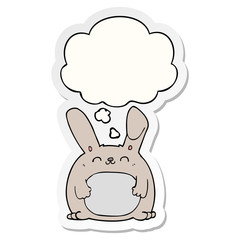 cartoon rabbit and thought bubble as a printed sticker