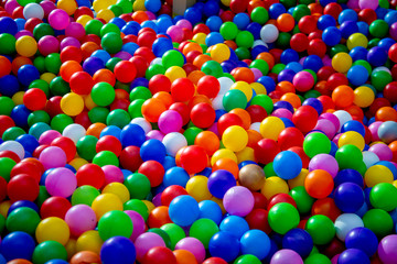 background of Colorful plastic balls in children's playroom