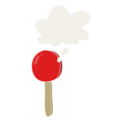cartoon lollipop and thought bubble in retro style