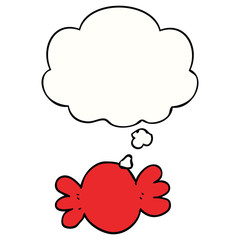 cartoon wrapped candy and thought bubble