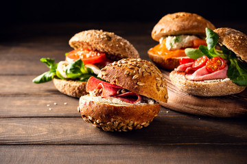 Sandwiche with salami and walnut, multigrain bun. Healthy lunch concept with copy space