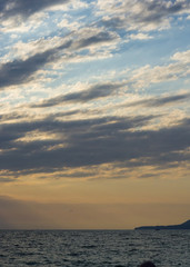 Amazing sea sunset, the sun, waves, clouds