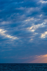 Amazing sea sunset, the sun, waves, clouds