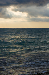 Amazing sea sunset, the sun, waves, clouds