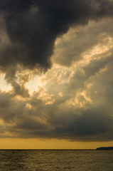 Amazing sea sunset, the sun, waves, clouds