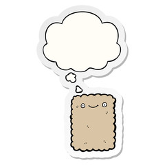cartoon biscuit and thought bubble as a printed sticker