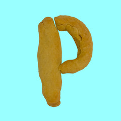 The letter "P" made from pastry, which can be eaten.