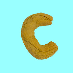 The letter "C" made from pastry, which can be eaten.