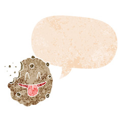 cartoon cookie and speech bubble in retro textured style