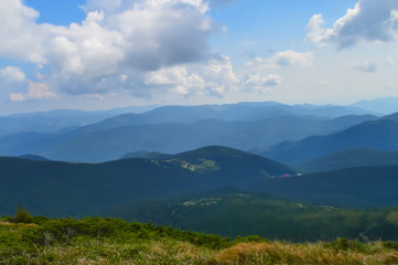Obraz na płótnie Canvas Panoramic view from Hoverla, Carpathian mountains, Ukraine. Horizontal outdoors shot
