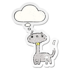cartoon cat and thought bubble as a distressed worn sticker