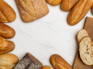 Bread at border on white background with place in center