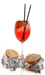 alcohol cocktail on a black background with fresh summer fruits and ice cubes. - 276016975