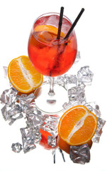 alcohol cocktail on a black background with fresh summer fruits and ice cubes. - 276016988
