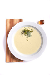 Creamy cauliflower soup. Vegetarian healthy food concept. Top view or flat lay.