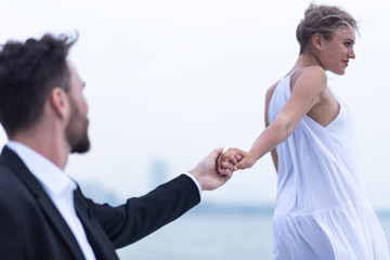 Couples are celebrating a wedding on a yacht.