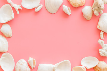 shells frame and seaside background for blog or desktop on pink table top view mockup