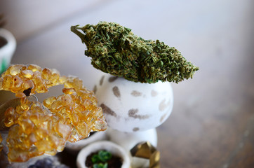 Cannabis and Crystals. Marijuana flower with healing crystal assortment. Citrine crystals. Medical...