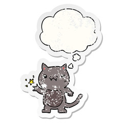 cartoon cat scratching and thought bubble as a distressed worn sticker