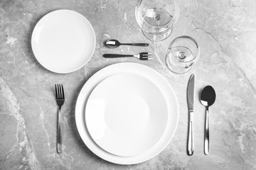 Stylish elegant table setting on grey marble surface, top view