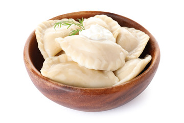 Bowl of tasty cooked dumplings isolated on white