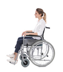 Young woman in wheelchair isolated on white