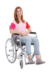 Obraz na płótnie Canvas Beautiful woman in wheelchair isolated on white