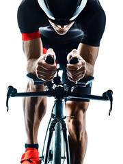 triathlete triathlon Cyclist cycling in studio silhouette shadow isolated on white background