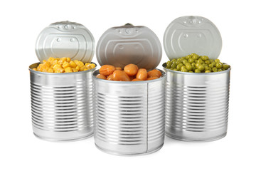 Open tin cans of peas, beans and corn kernels isolated on white