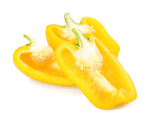 Fototapeta na wymiar Cut yellow bell peppers isolated on white