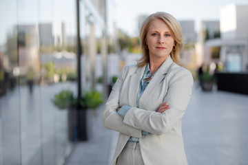 Portrait of an attractive attorney, lawyer, CEO, proud, successful, elegant and distinguished at workplace