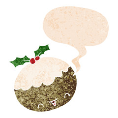 cute cartoon christmas pudding and speech bubble in retro textured style