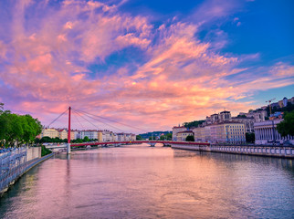 Fototapeta na wymiar A view of Lyon, France along the Saône river at sunset.