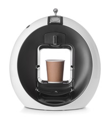 Modern coffee machine with cup on white background