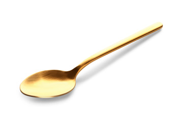 Golden spoon on white background