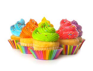Sweet tasty cupcakes on white background